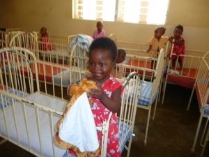 Little girl with donated toy